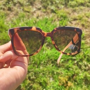 Margaret Joseph's Plastic Sunglasses